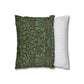 Two pillows, one with a green floral pattern and the other with white stripes, on a white background.