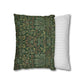 Two pillows, one with a green floral pattern and the other with white stripes, on a white background.