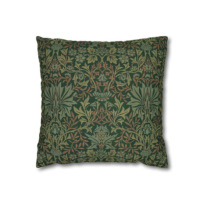 Decorative pillow with a green floral pattern on a white background