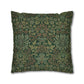 Decorative pillow with intricate green and brown floral pattern on a white background