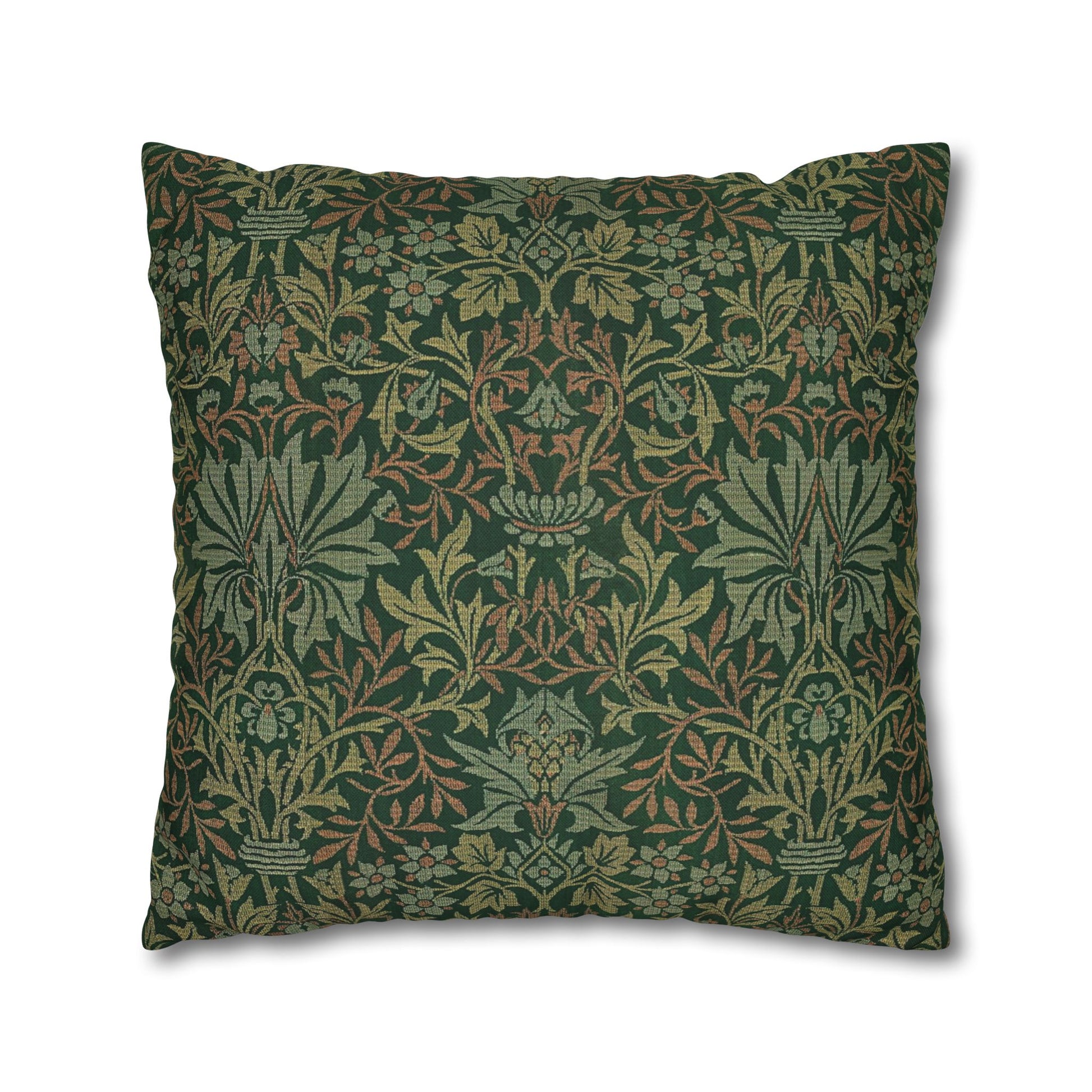 Decorative pillow with intricate green and brown floral pattern on a white background