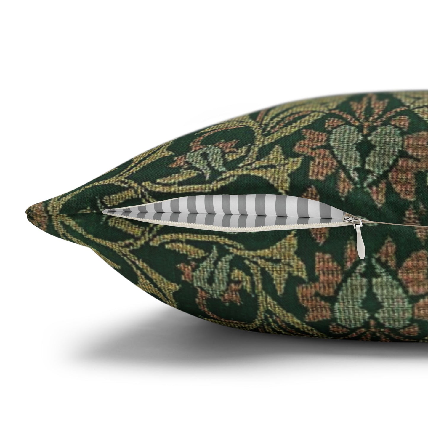 Decorative pillow with a green floral pattern on a white background