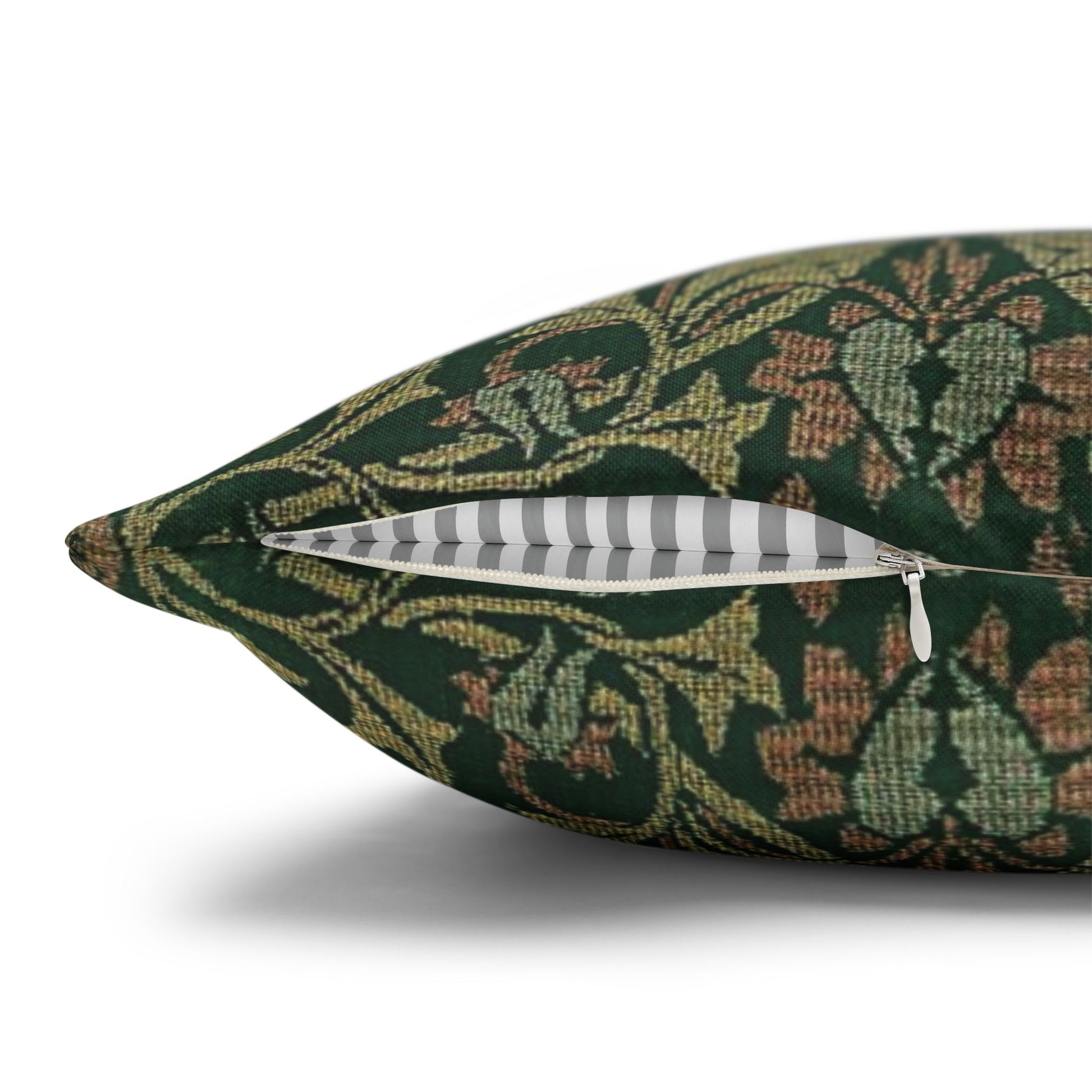 Decorative pillow with a green floral pattern on a white background