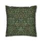 Decorative pillow with intricate green and brown floral pattern on a white background