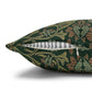 Decorative pillow with a green floral pattern on a white background