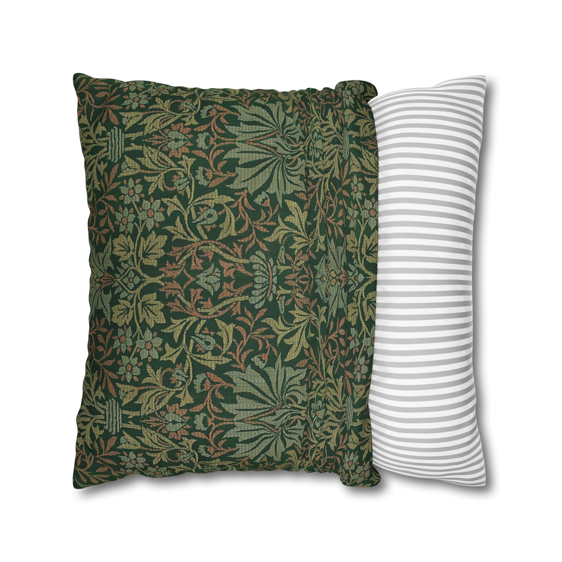 Two pillows, one with a green floral pattern and the other with white stripes, on a white background.