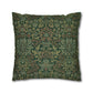 Decorative pillow with intricate green and brown floral pattern on a white background