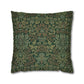 Decorative pillow with intricate green and brown pattern on a white background