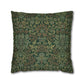 Decorative pillow with intricate green and brown pattern on a white background