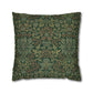 Decorative pillow with intricate green and brown pattern on a white background