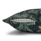 Decorative pillow with a leaf pattern on a white background