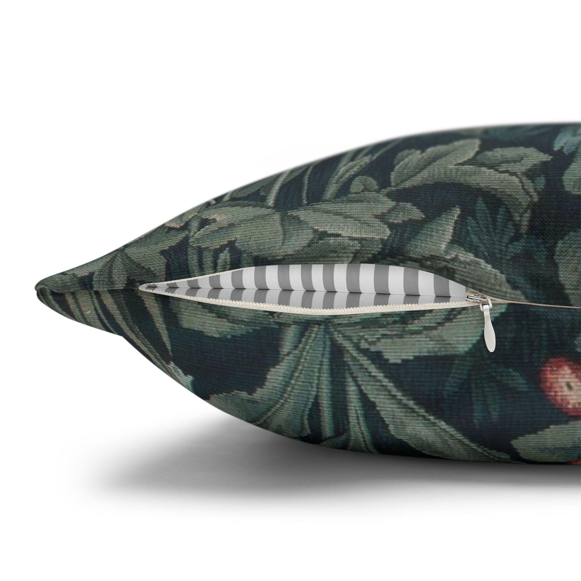 Decorative pillow with a leaf pattern on a white background