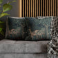Decorative pillows with deer design on a gray sofa against a wooden slat wall.