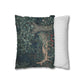 Decorative pillow with nature-themed design next to a striped pillow on a white background