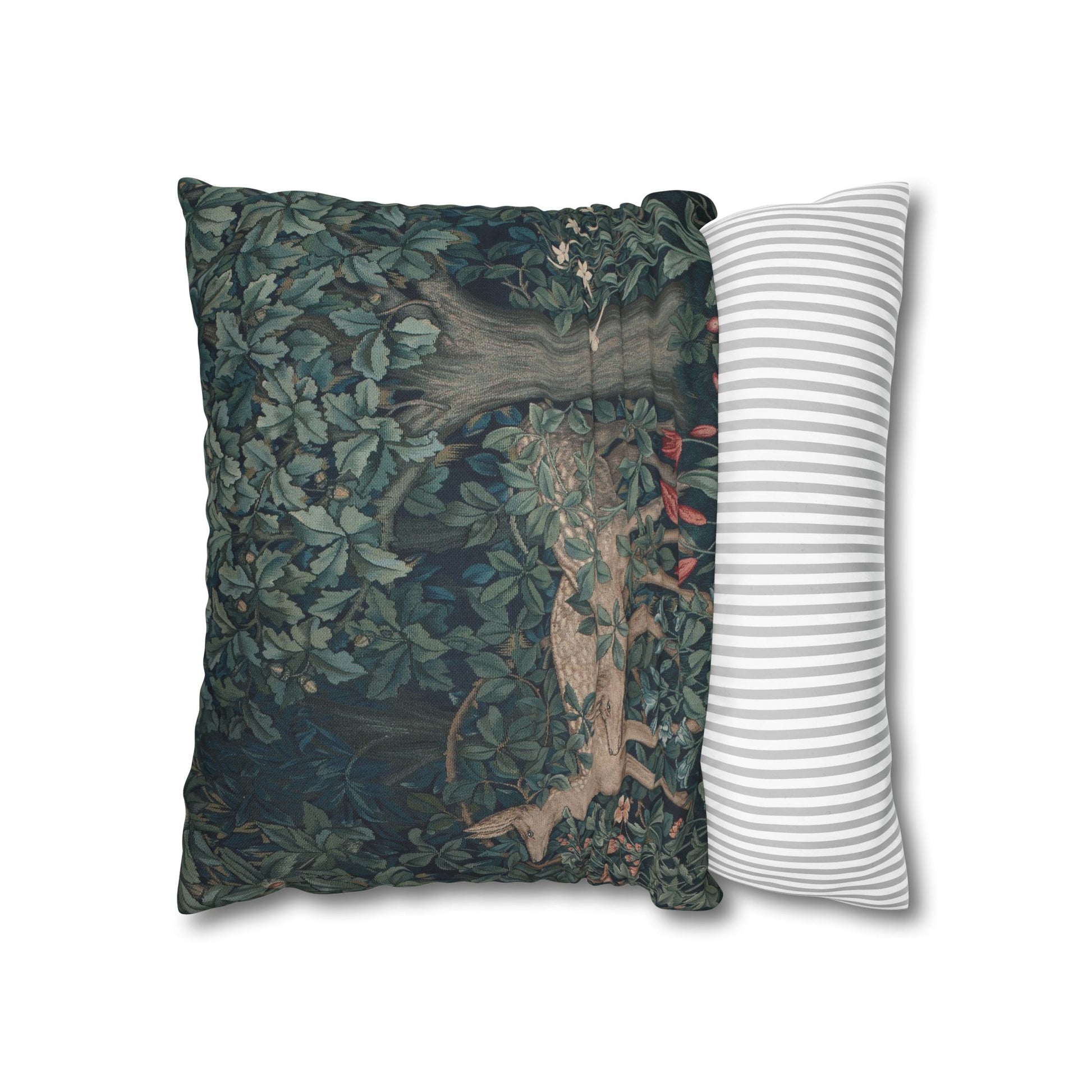 Two pillows, one with a nature-themed design and the other with a striped pattern, on a white background.