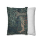 Decorative pillow with nature-themed design next to a striped pillow on a white background
