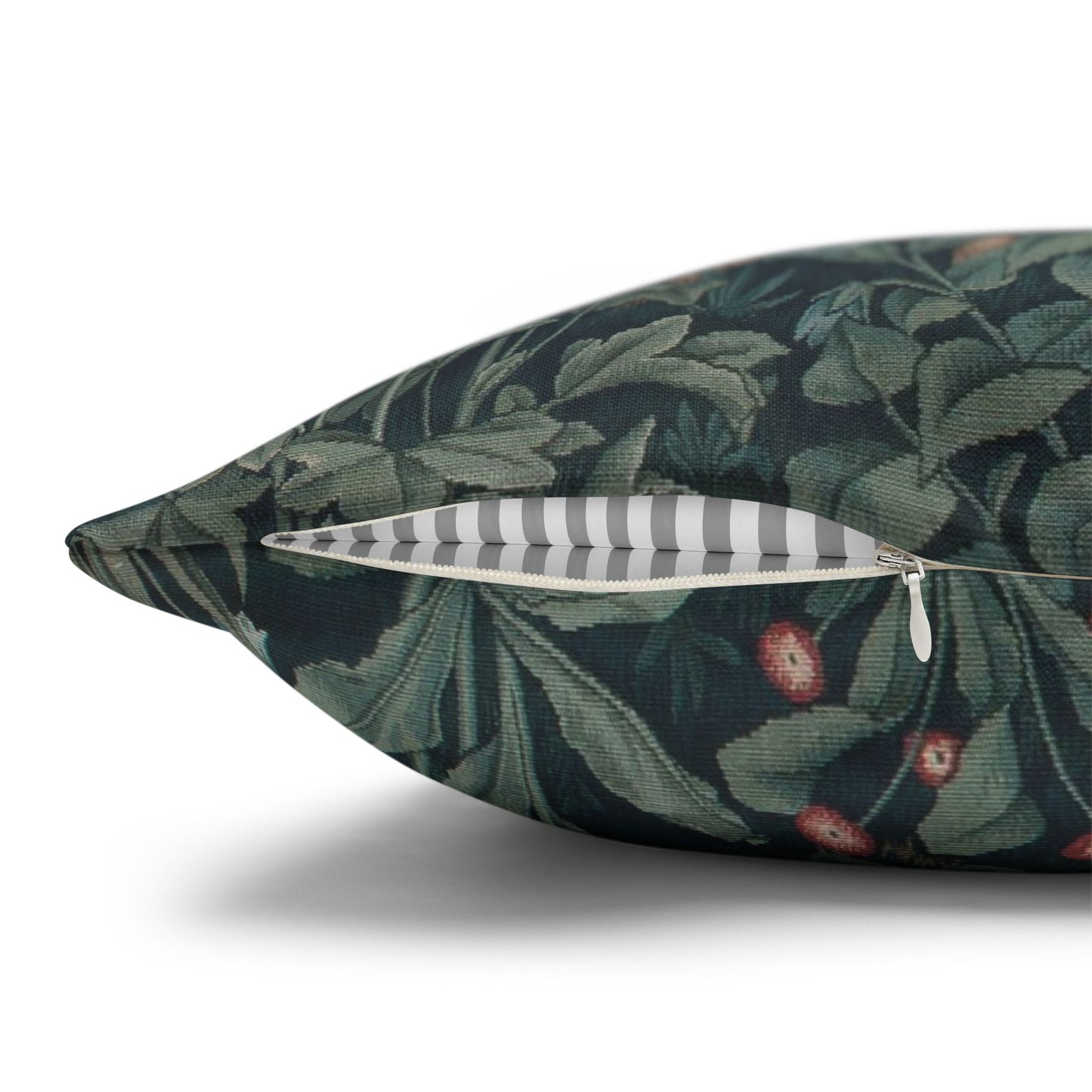 Decorative pillow with a leaf pattern on a white background