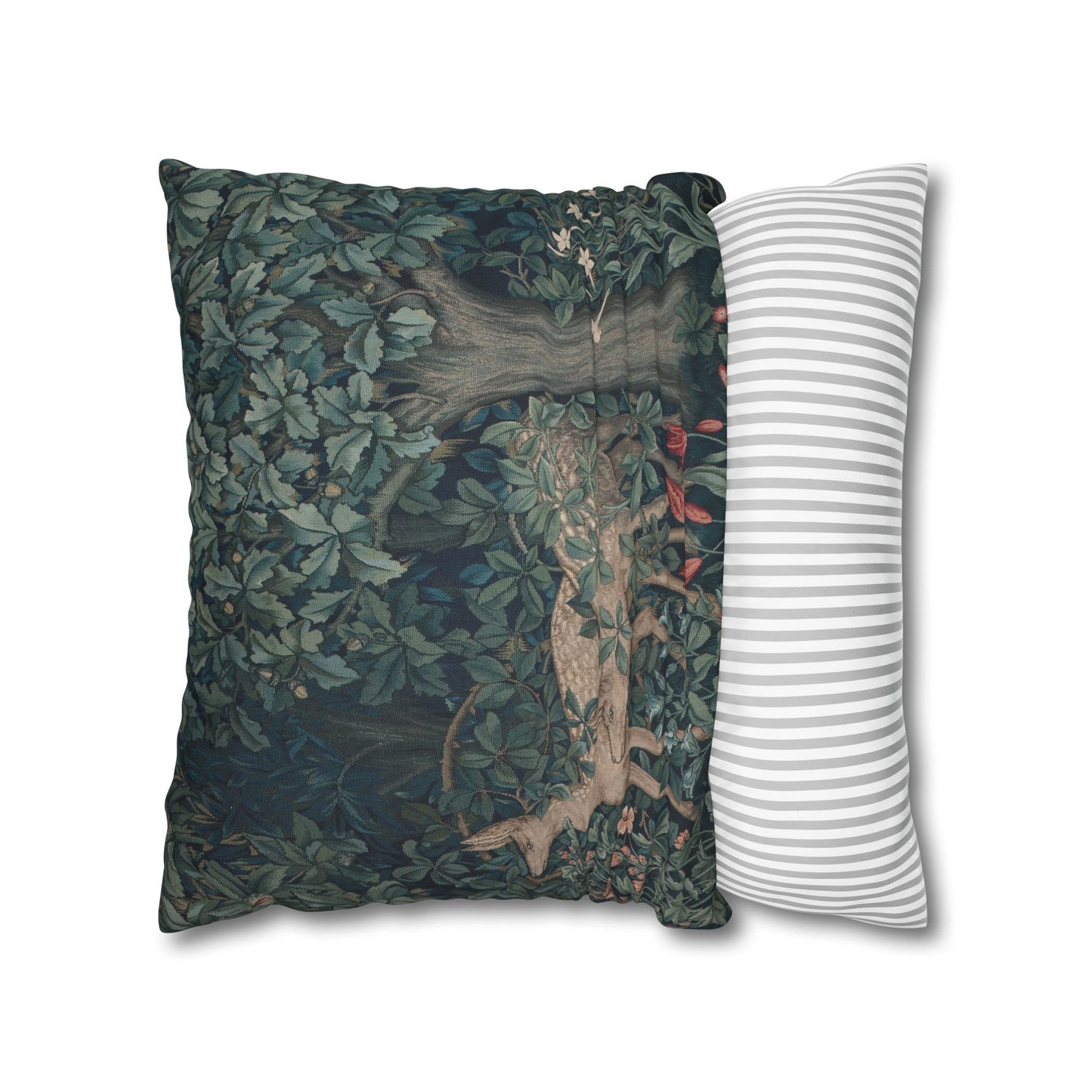 Decorative pillow with nature-themed design and a striped pillow next to it on a white background