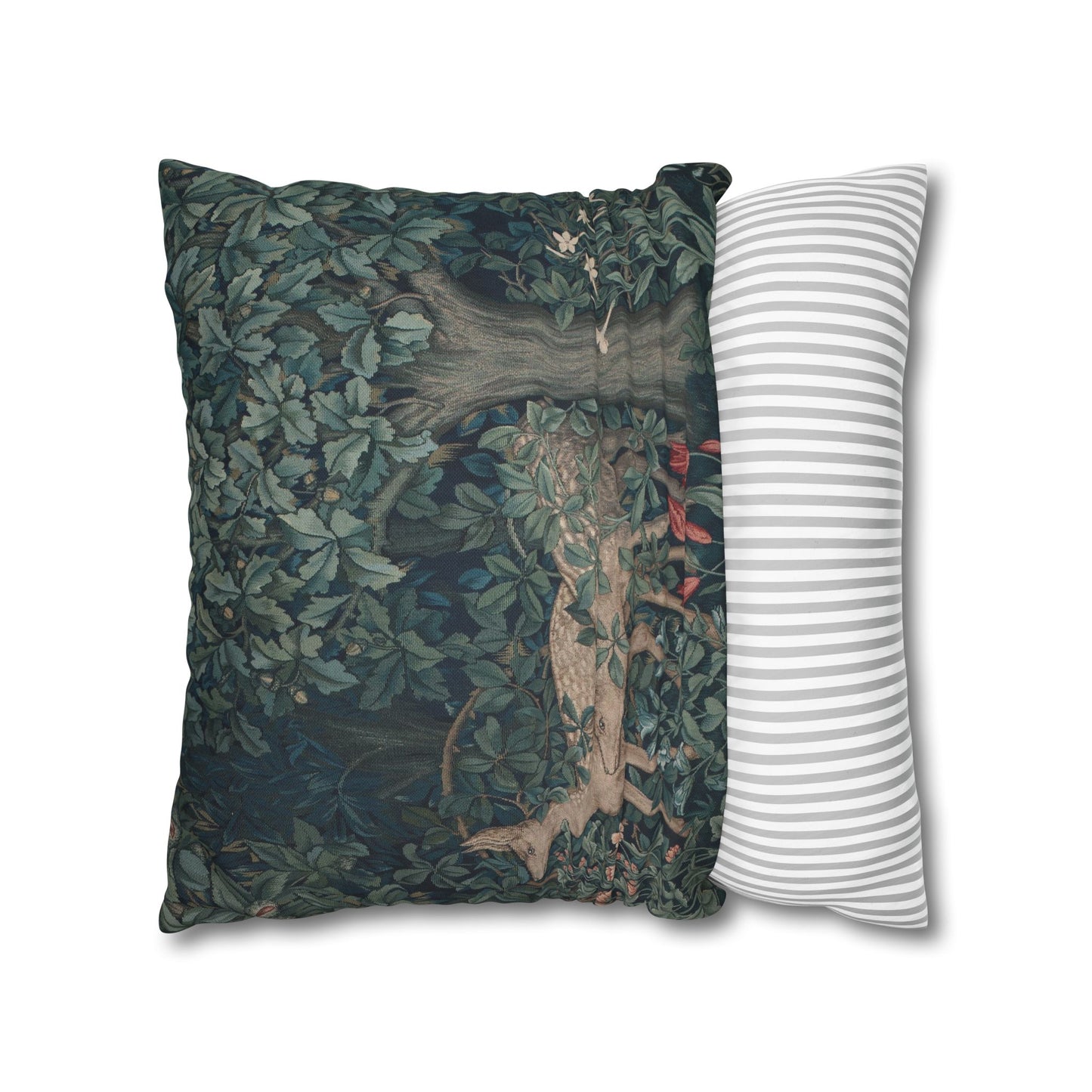 Decorative pillow with nature-themed design and a striped pillow next to it on a white background