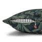 Decorative pillow with green leaf pattern on a white background