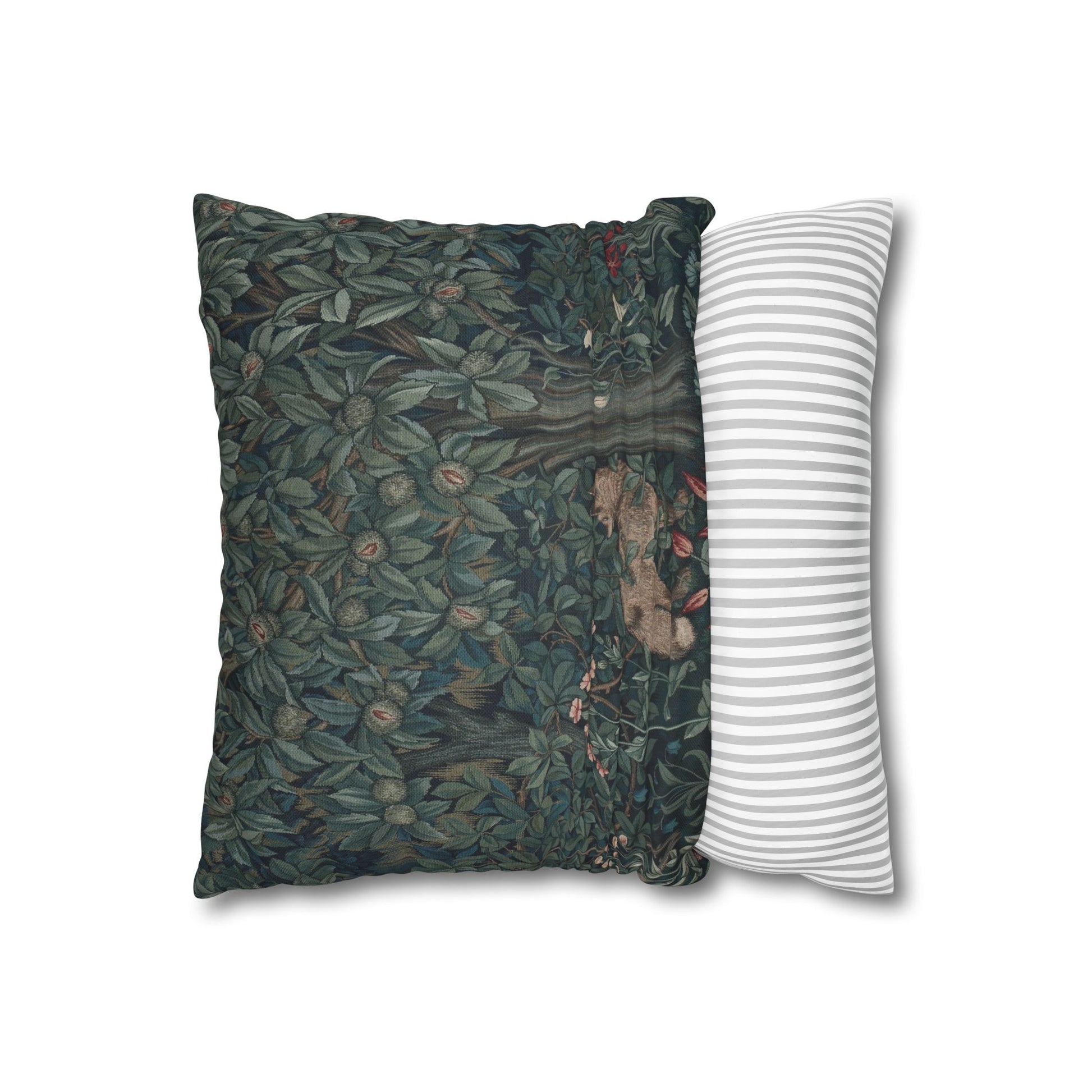 Two pillows, one with a nature-themed design and the other with a striped pattern, on a white background - William Morris Greenery