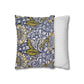 Two pillows, one with floral pattern and one with stripes, on a white background