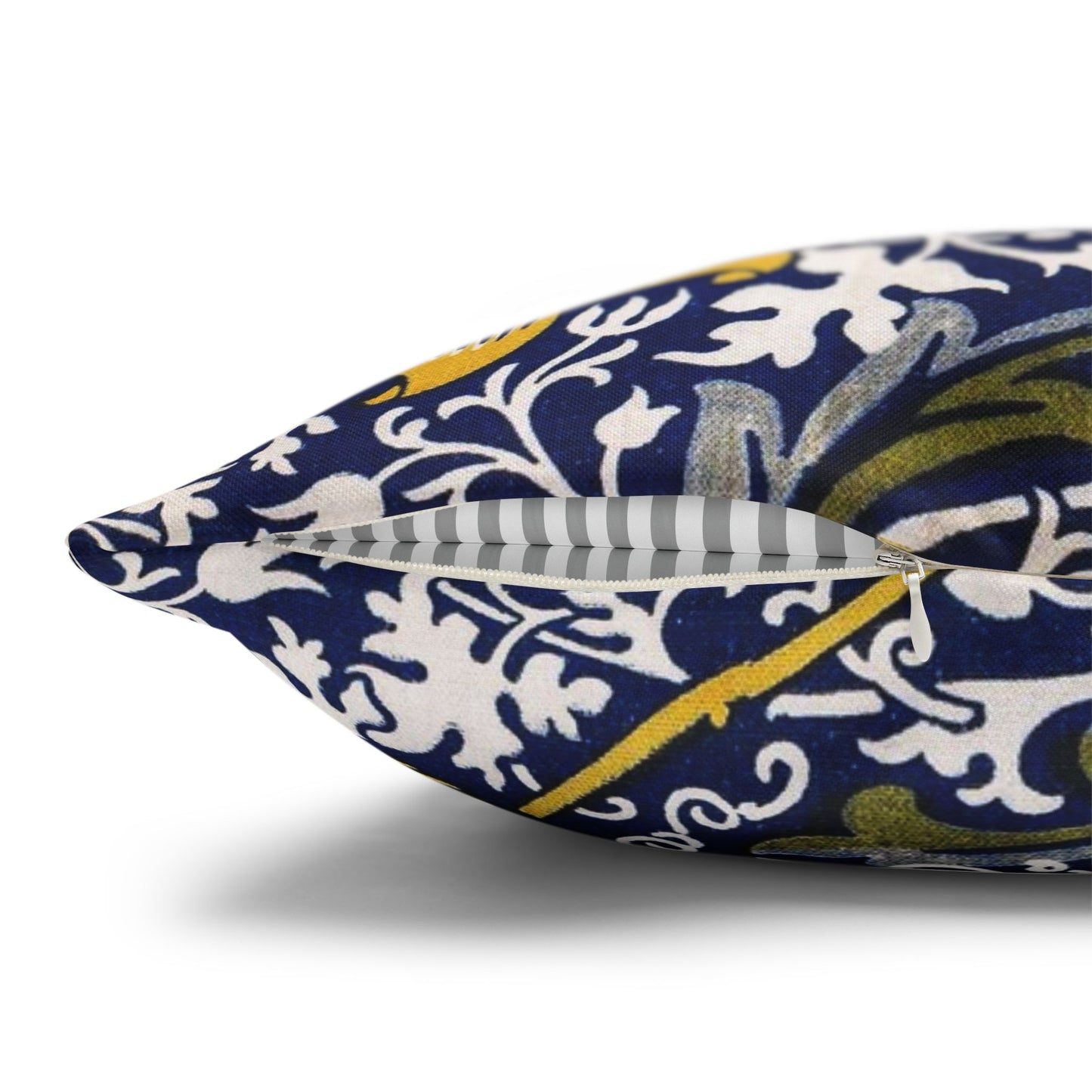 Decorative pillow with intricate pattern on a white background