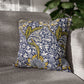 Decorative pillow with floral pattern on a gray sofa