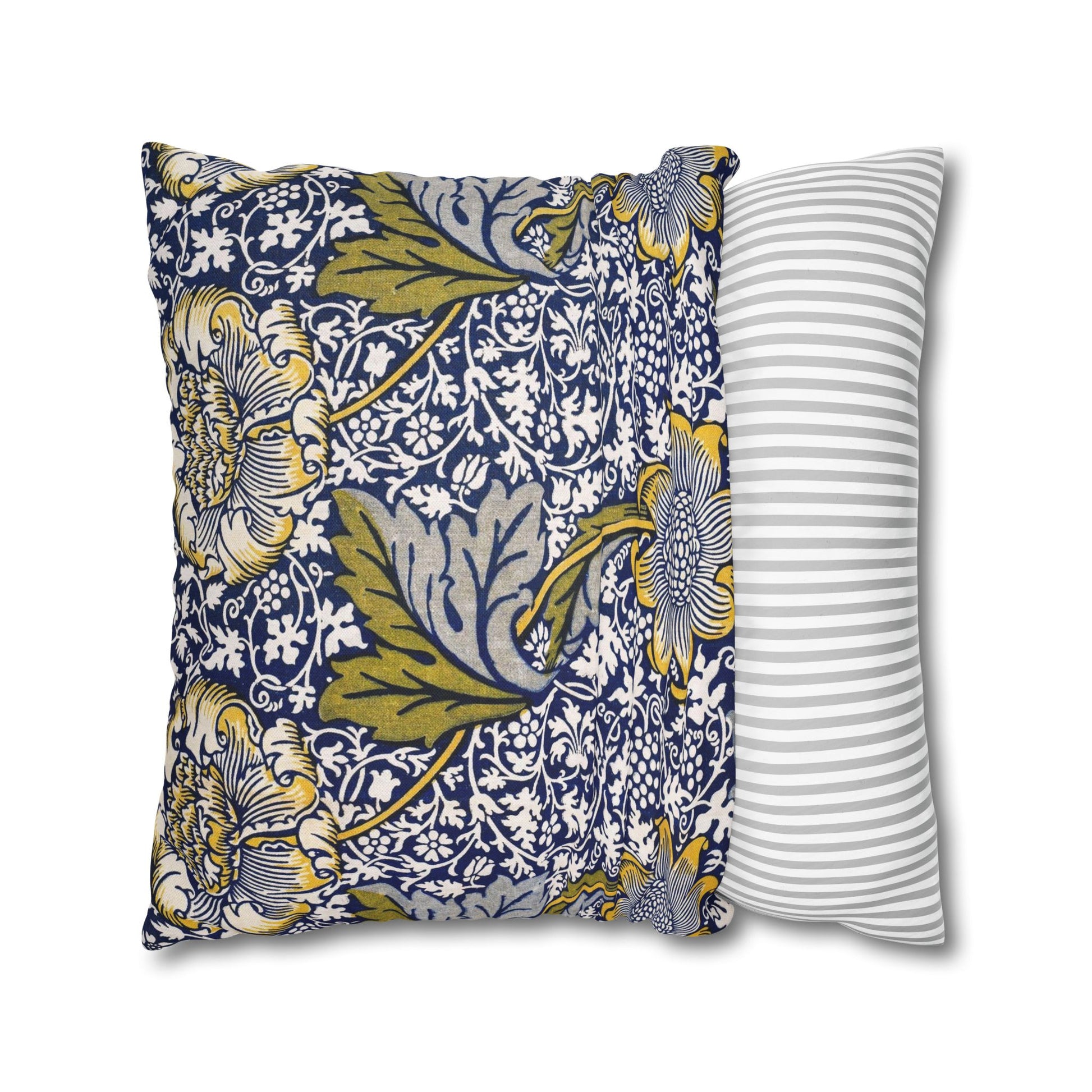 Two pillows, one with floral pattern and one with stripes, on a white background