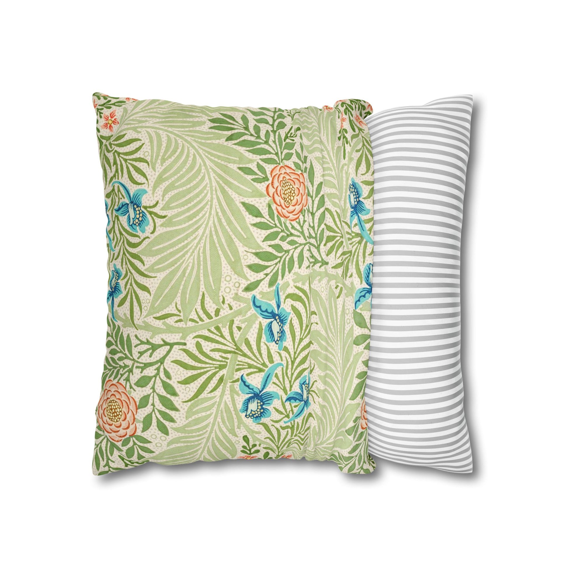 Two pillows, one with a floral pattern and the other with a striped pattern, on a white background.