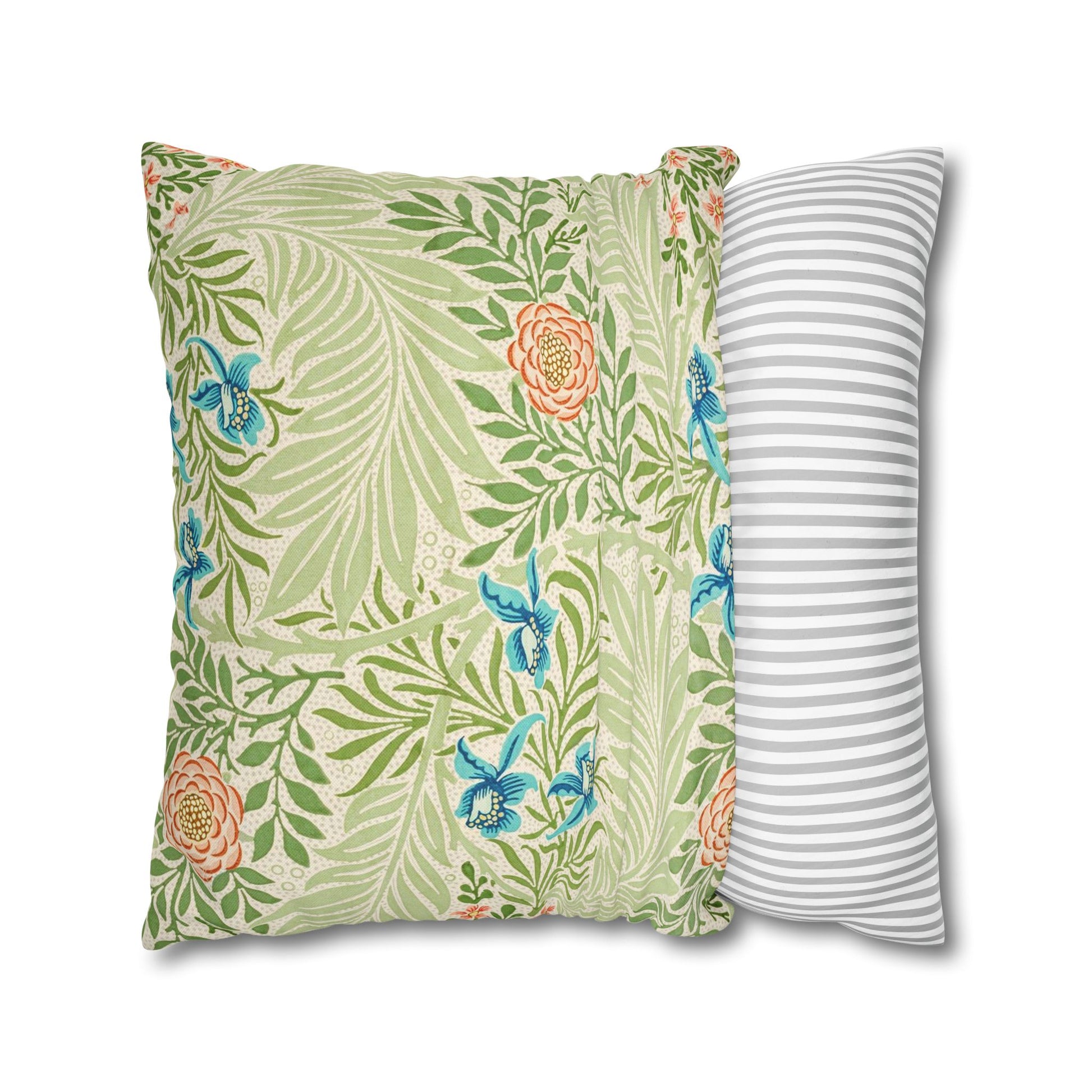 Two pillows, one with a floral pattern and the other with a striped pattern, on a white background.