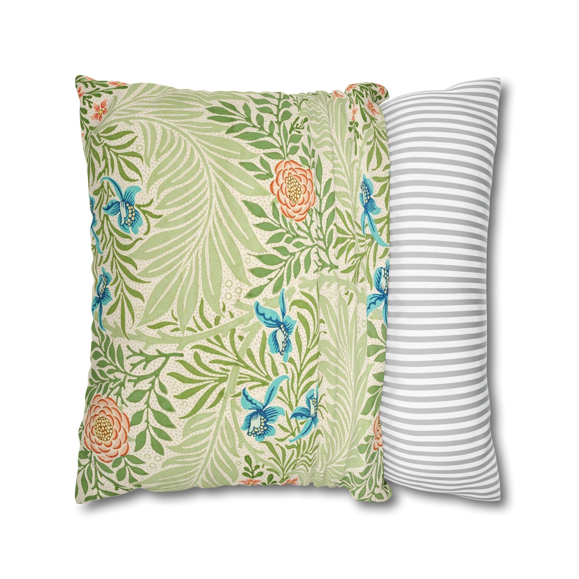 Two pillows, one with a floral pattern and the other with a striped pattern, on a white background.