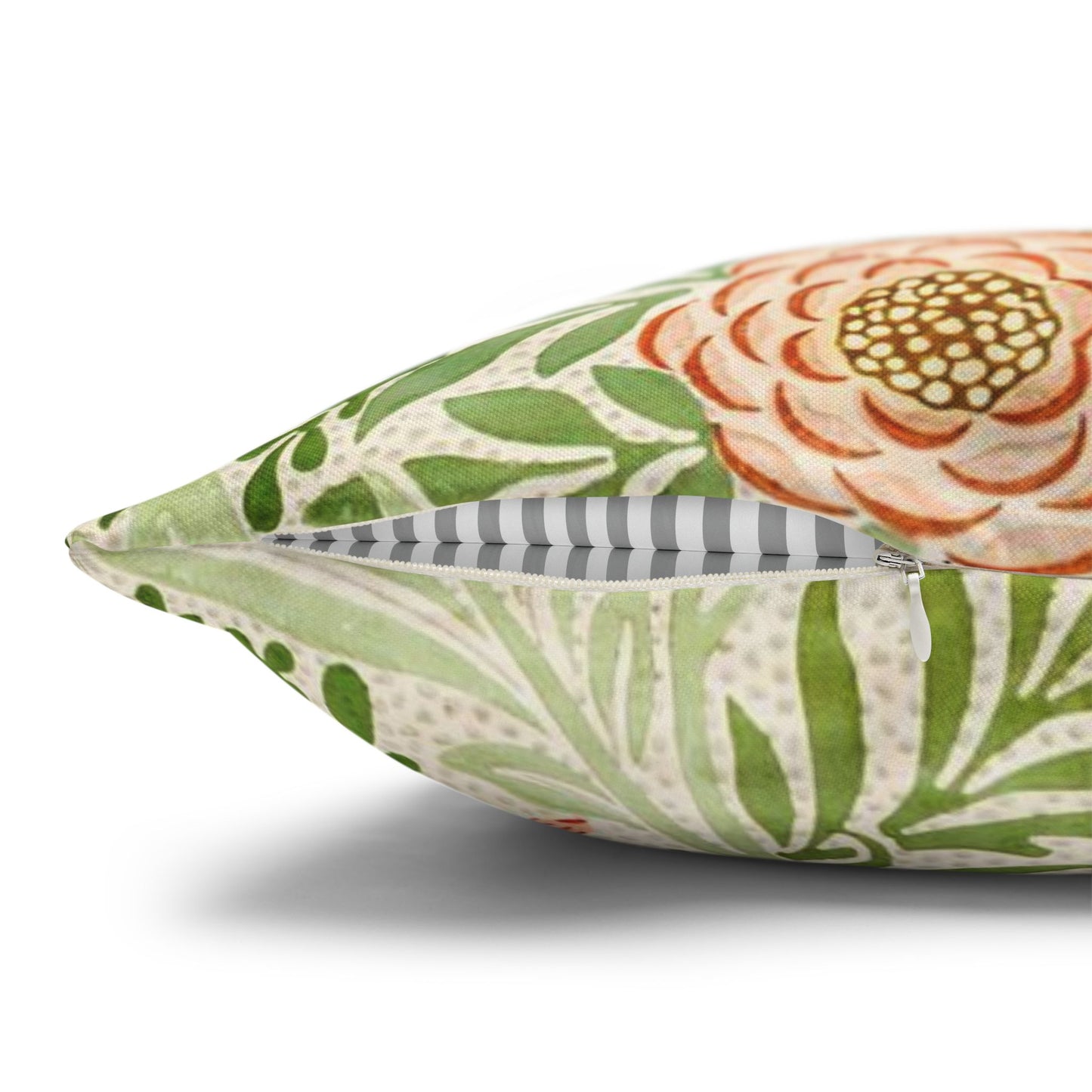 Decorative pillow with floral pattern on a white background