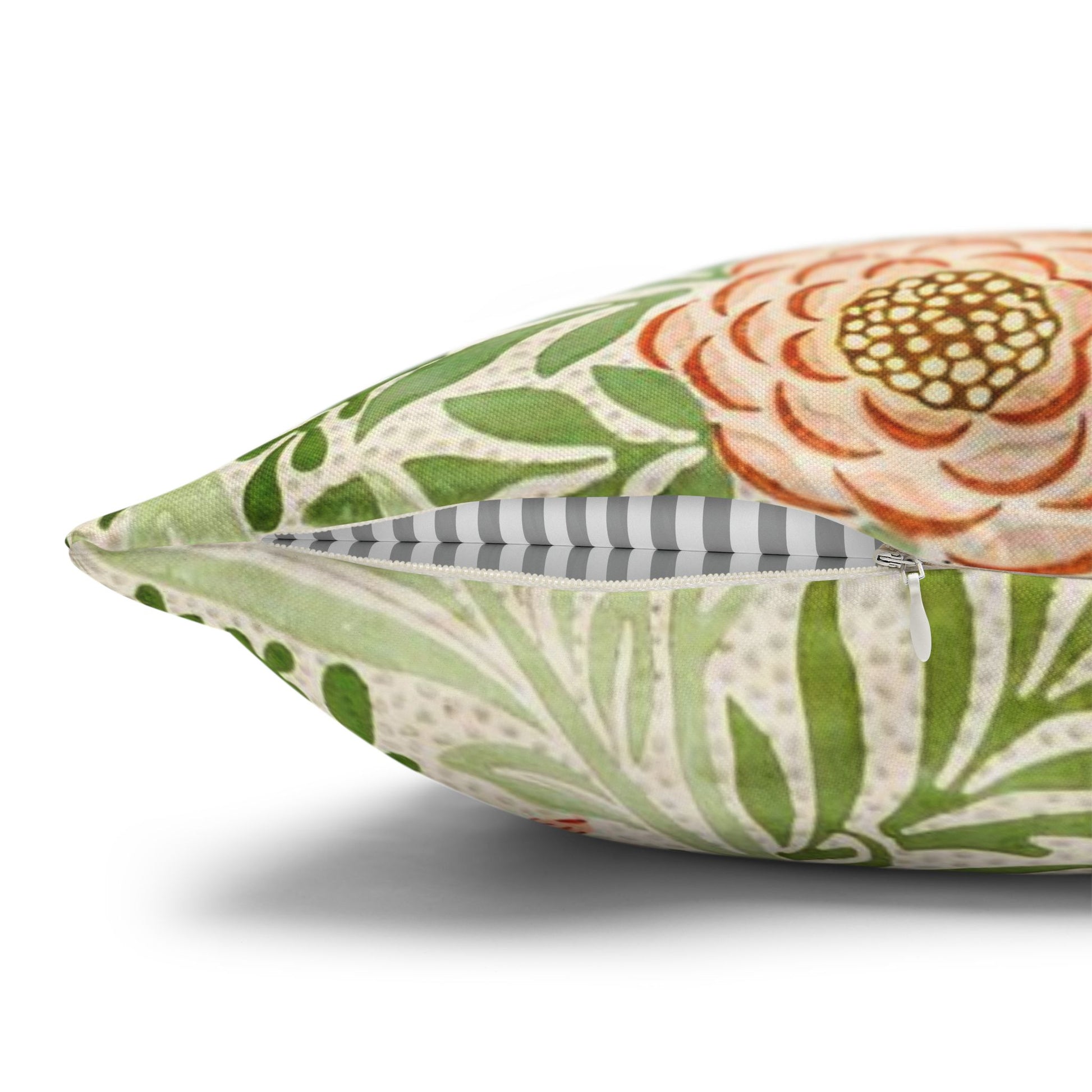 Decorative pillow with floral pattern on a white background