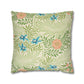 Decorative pillow with floral and butterfly pattern on a white background