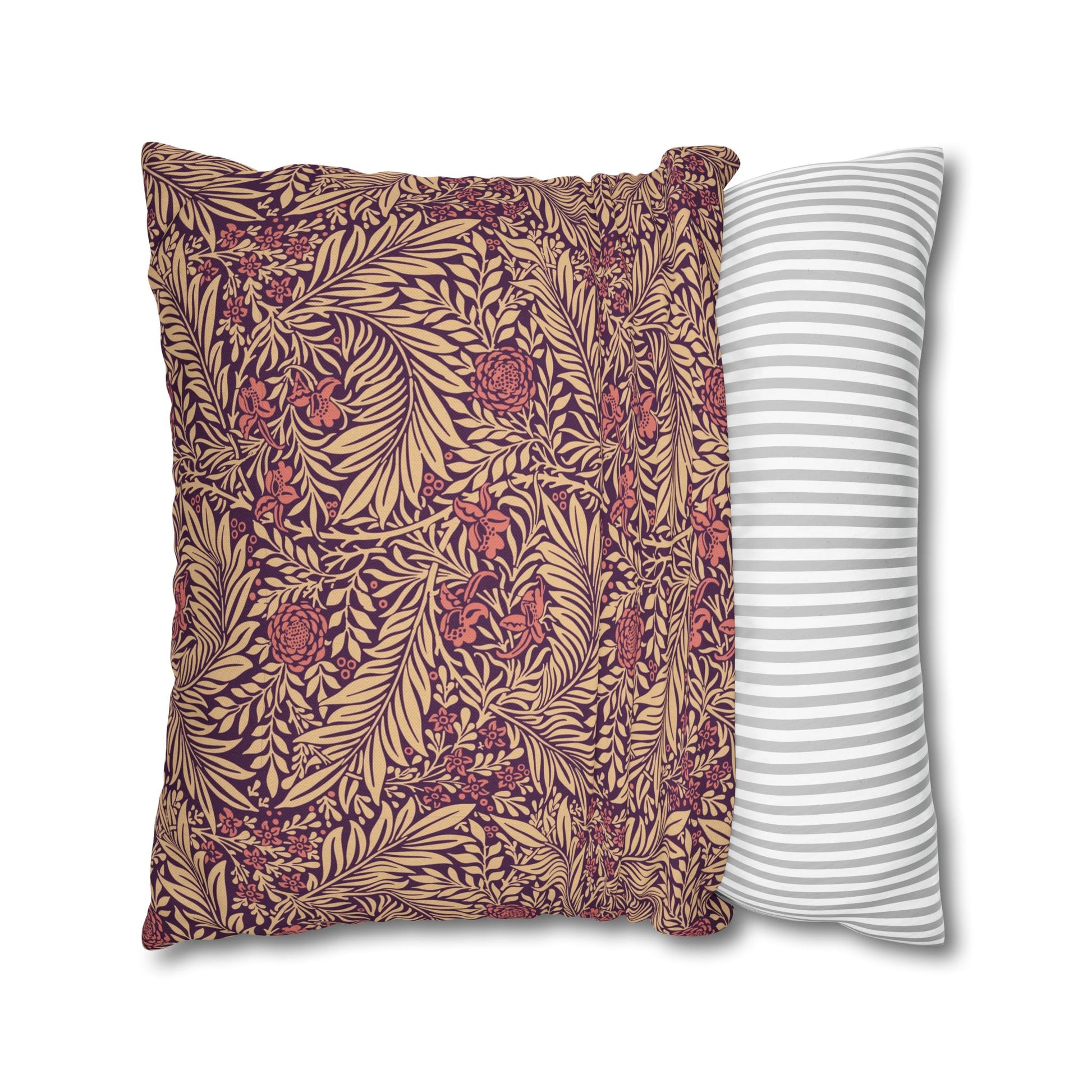 Two pillows, one with a floral pattern and the other with a striped pattern, on a white background.