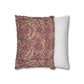 Two pillows, one with a floral pattern and the other with a striped pattern, on a white background.