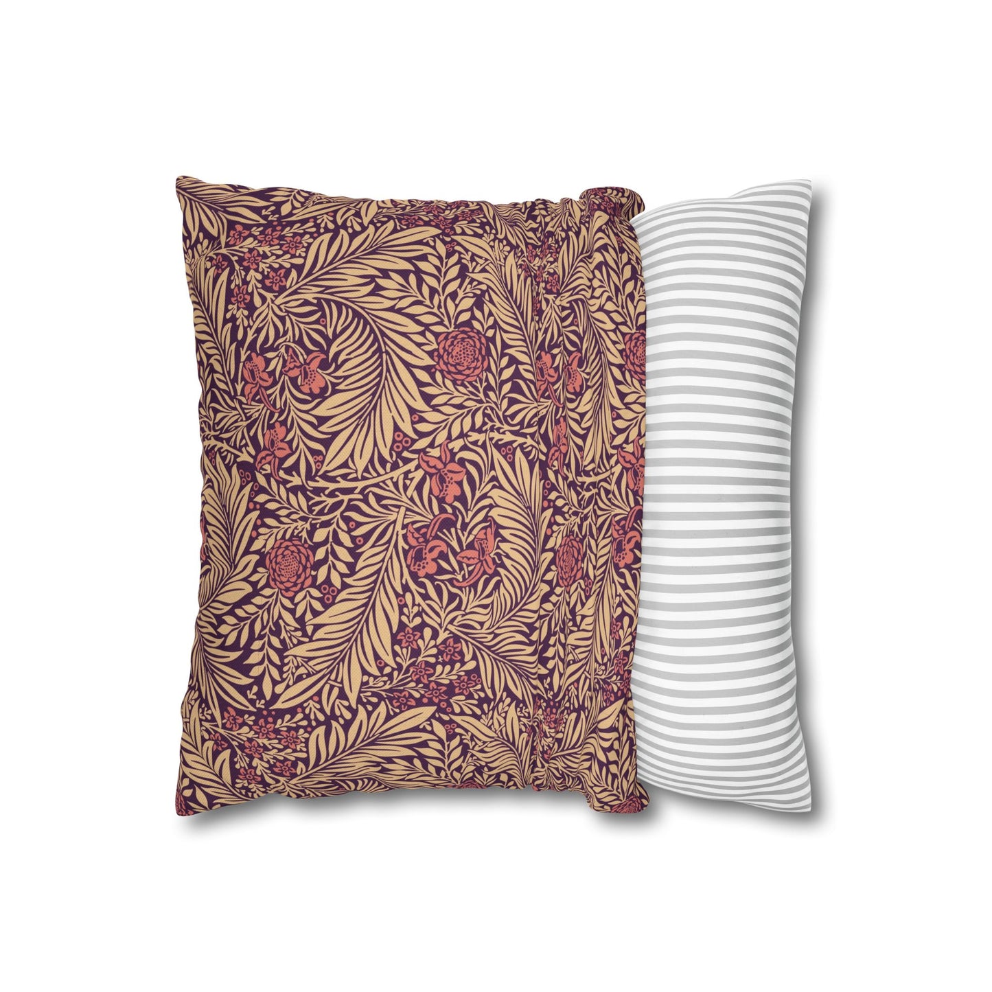 Two pillows, one with a floral pattern and the other with a striped pattern, on a white background.