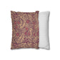 Two pillows, one with a floral pattern and the other with a striped pattern, on a white background.
