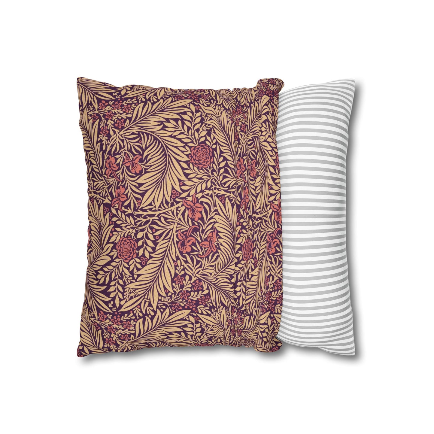 Two pillows, one with a floral pattern and the other with a striped pattern, on a white background.