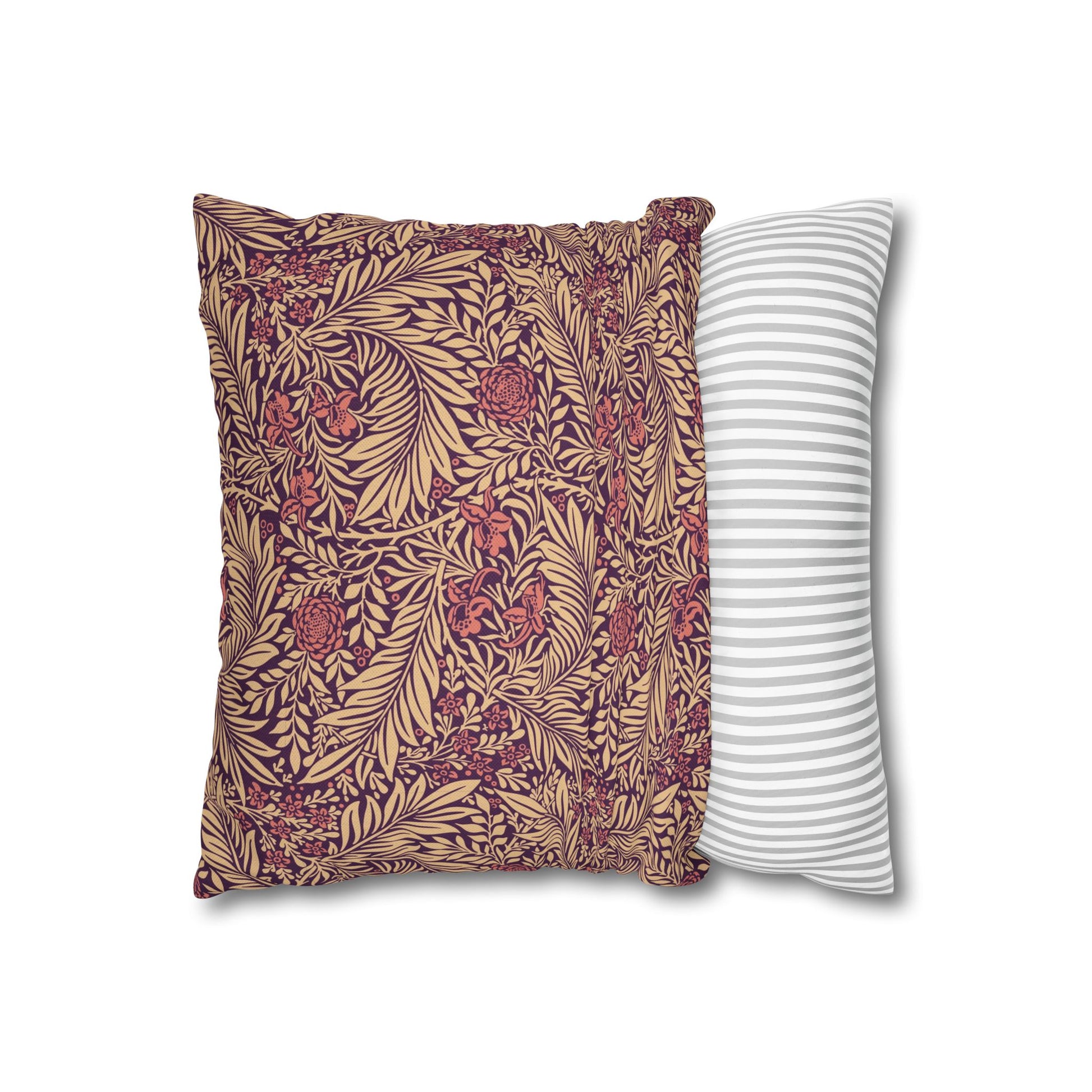 Two pillows, one with a floral pattern and the other with a striped pattern, on a white background.