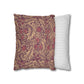 Two pillows, one with a floral pattern and the other with a striped pattern, on a white background.