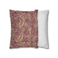 Two pillows, one with a floral pattern and the other with a striped pattern, on a white background.