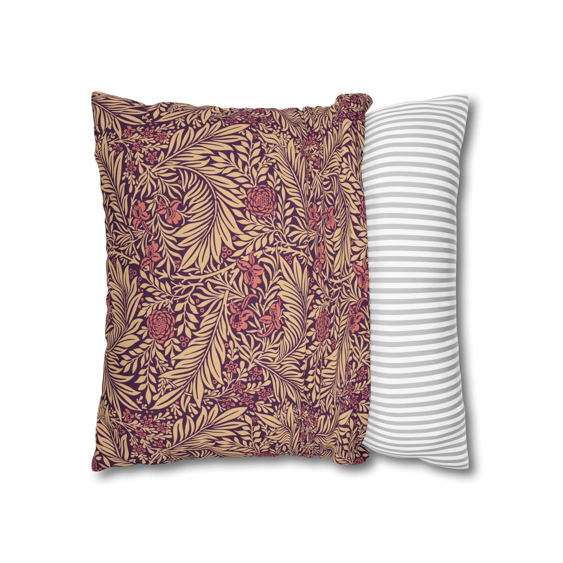 Two pillows, one with a floral pattern and the other with a striped pattern, on a white background.