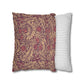 Two pillows, one with a floral pattern and the other with a striped pattern, on a white background.