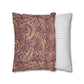 Two pillows, one with a floral pattern and the other with a striped pattern, on a white background.