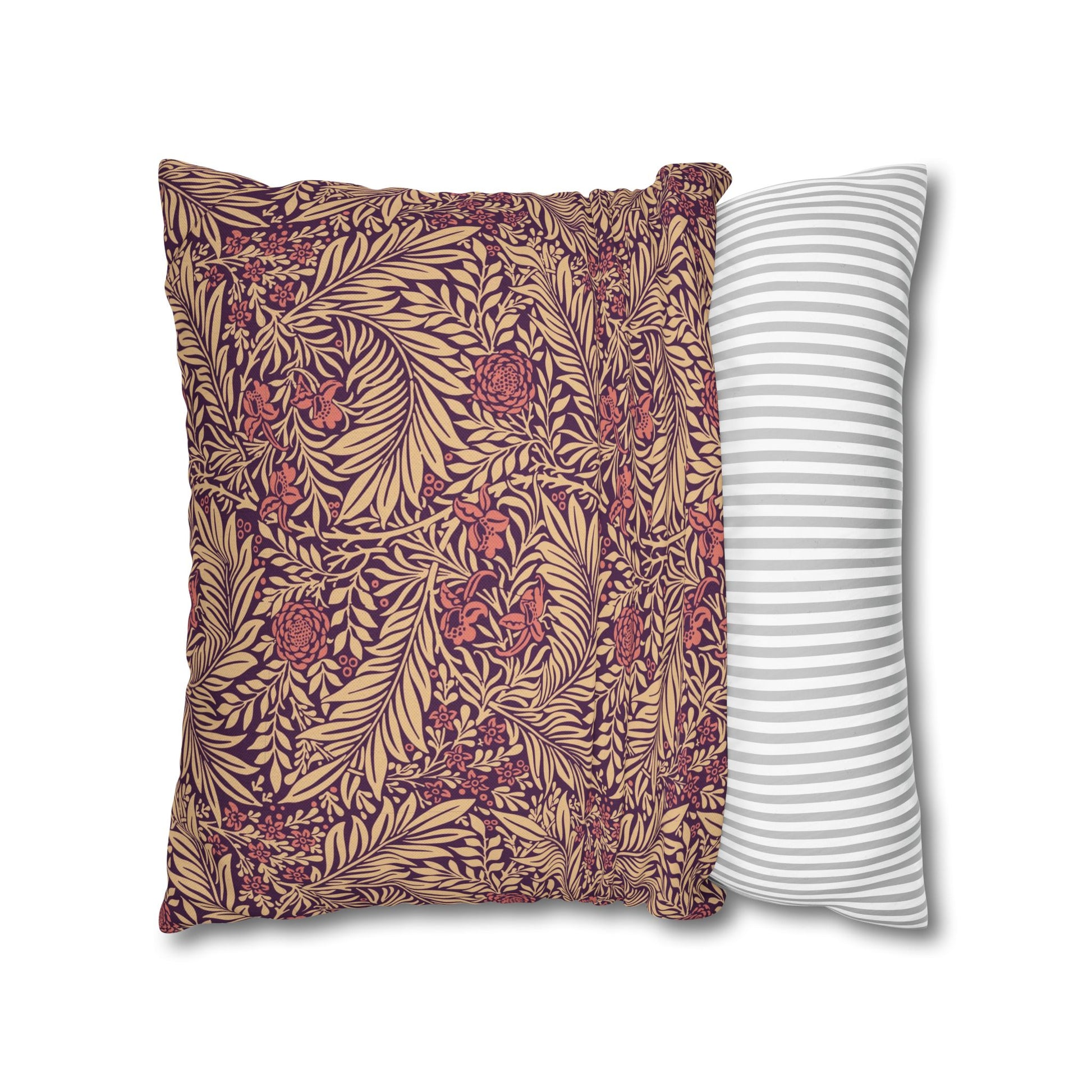 Two pillows, one with a floral pattern and the other with a striped pattern, on a white background.