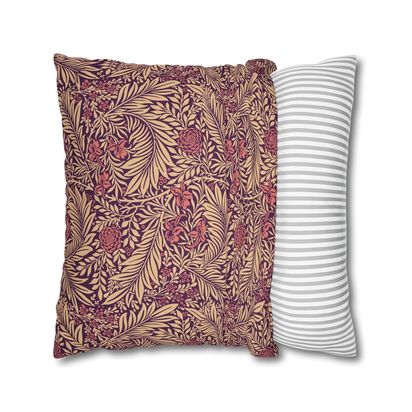 Two pillows, one with a floral pattern and the other with a striped pattern, on a white background.