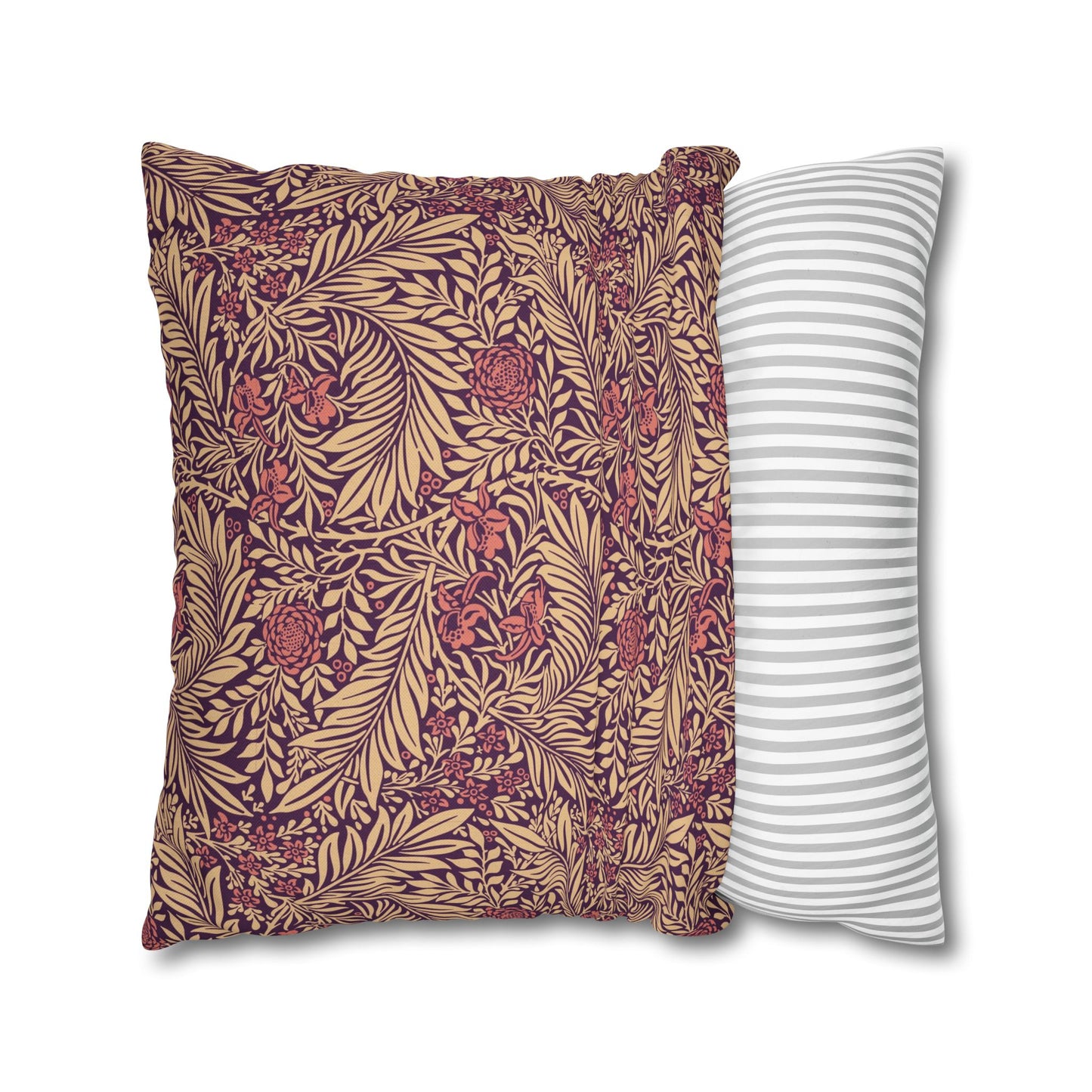Two pillows, one with a floral pattern and the other with a striped pattern, on a white background.