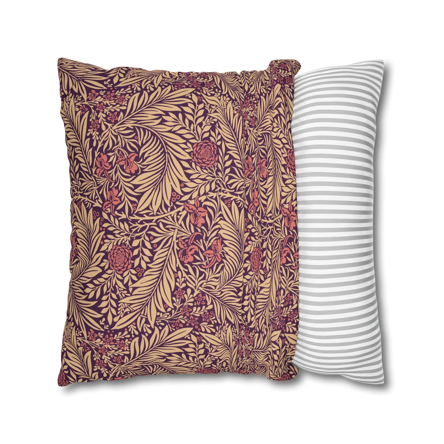 Two pillows, one with a floral pattern and the other with a striped pattern, on a white background.